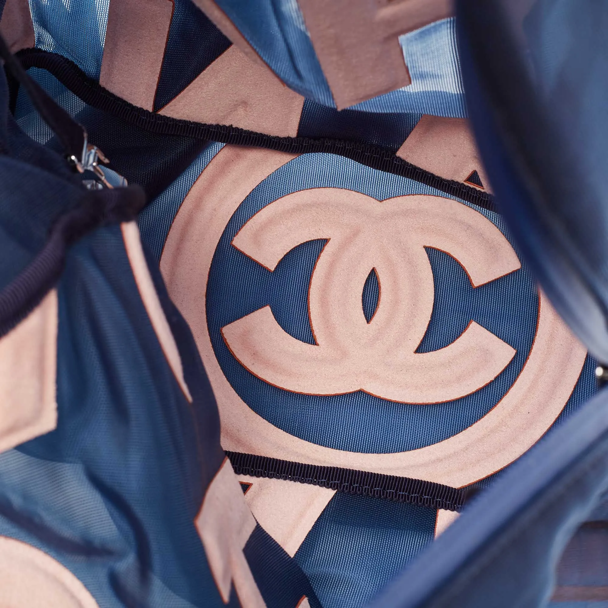CHANEL Blue/Pink Mesh Logo Backpack